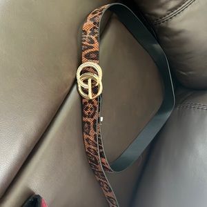 Cheetah printed belt with gems.